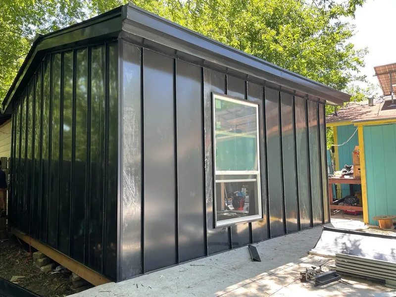 Black standing seam metal wall panels for Roof Inspection in Owatonna