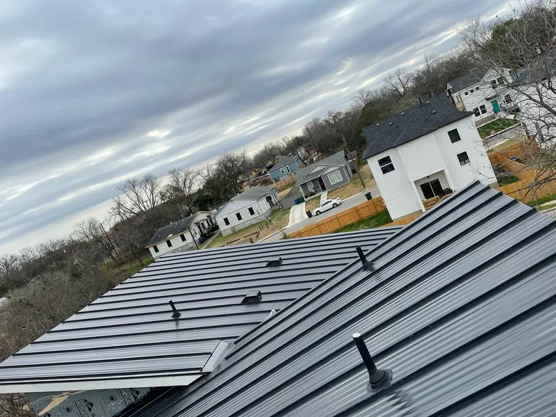 Standing seam metal roof panels with vents for Skylight Repair in Owatonna